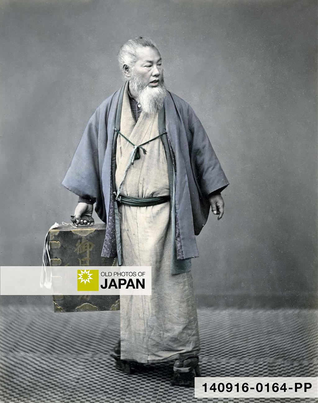 Japanese dentist carrying his tools in a box, ca. 186