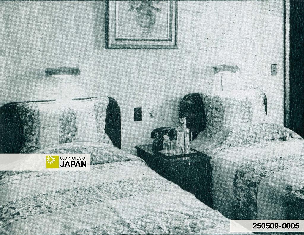 Overhead reading lamps in a New Osaka Hotel bedroom, ca. 1935