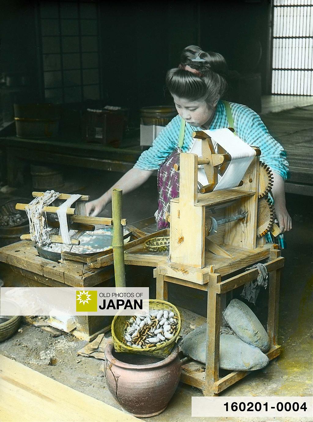 Young Japanese woman spinning silk at home, ca. 1900s