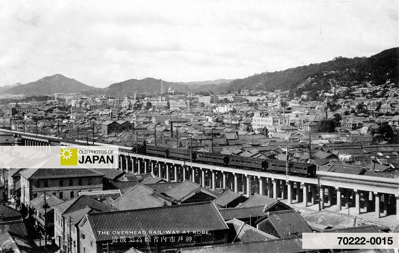 70222-0015 - Steam Train on Elevated Railway Tracks in Kobe
