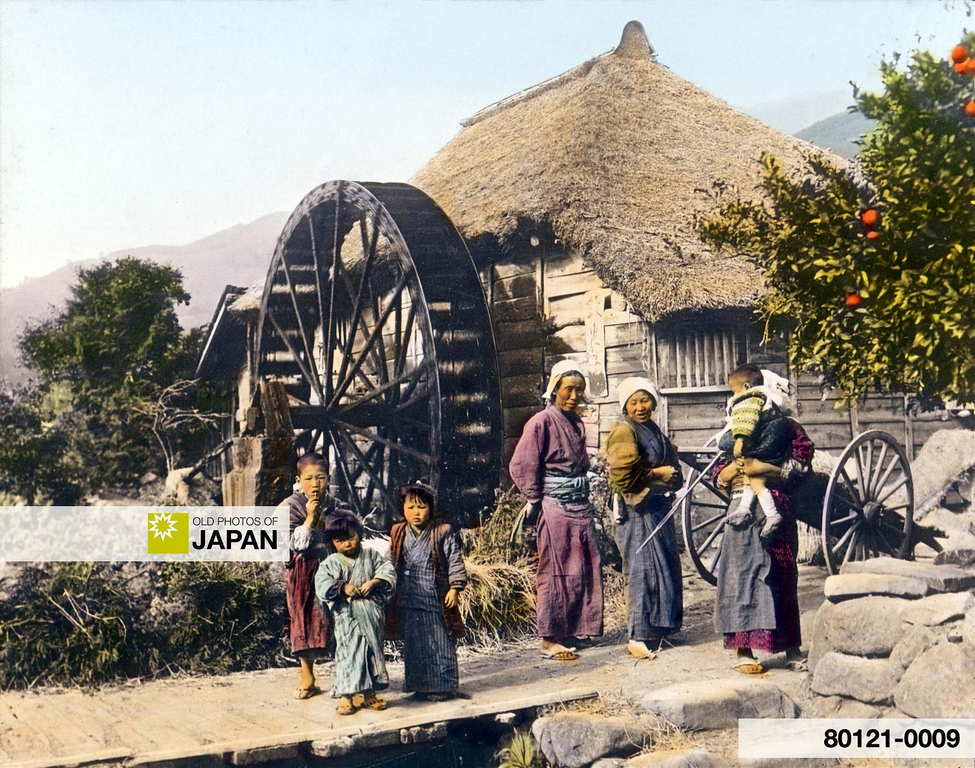 80121-0009 - Women and children in front of a Japanese grist mill, 1920s