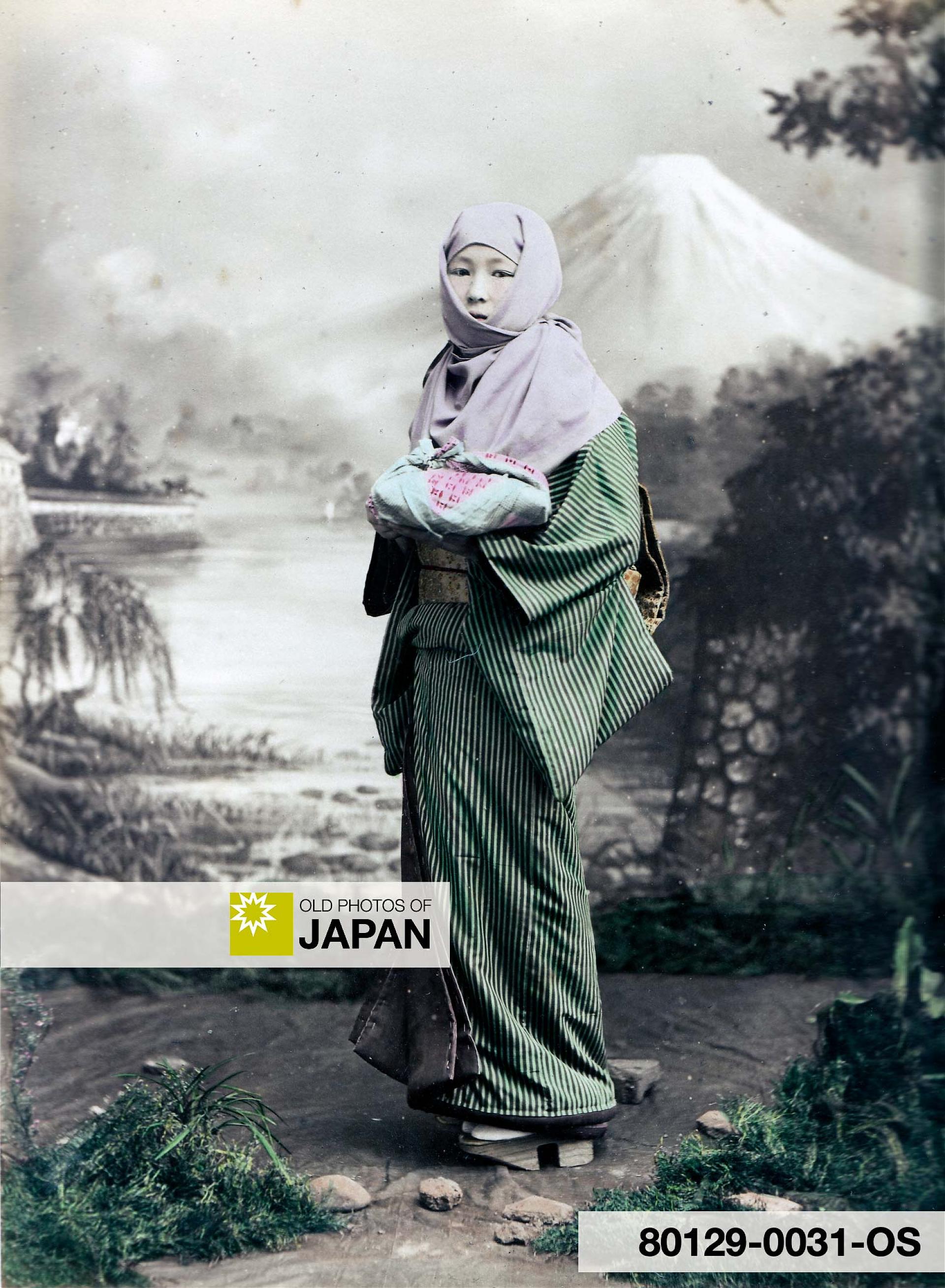 80129-0031 - Japanese woman in winter clothing, 1890s